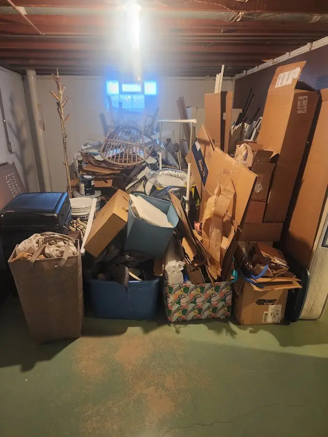 Roll-off dumpster container at job site for Yard Waste Dumpster Rental in North Shore